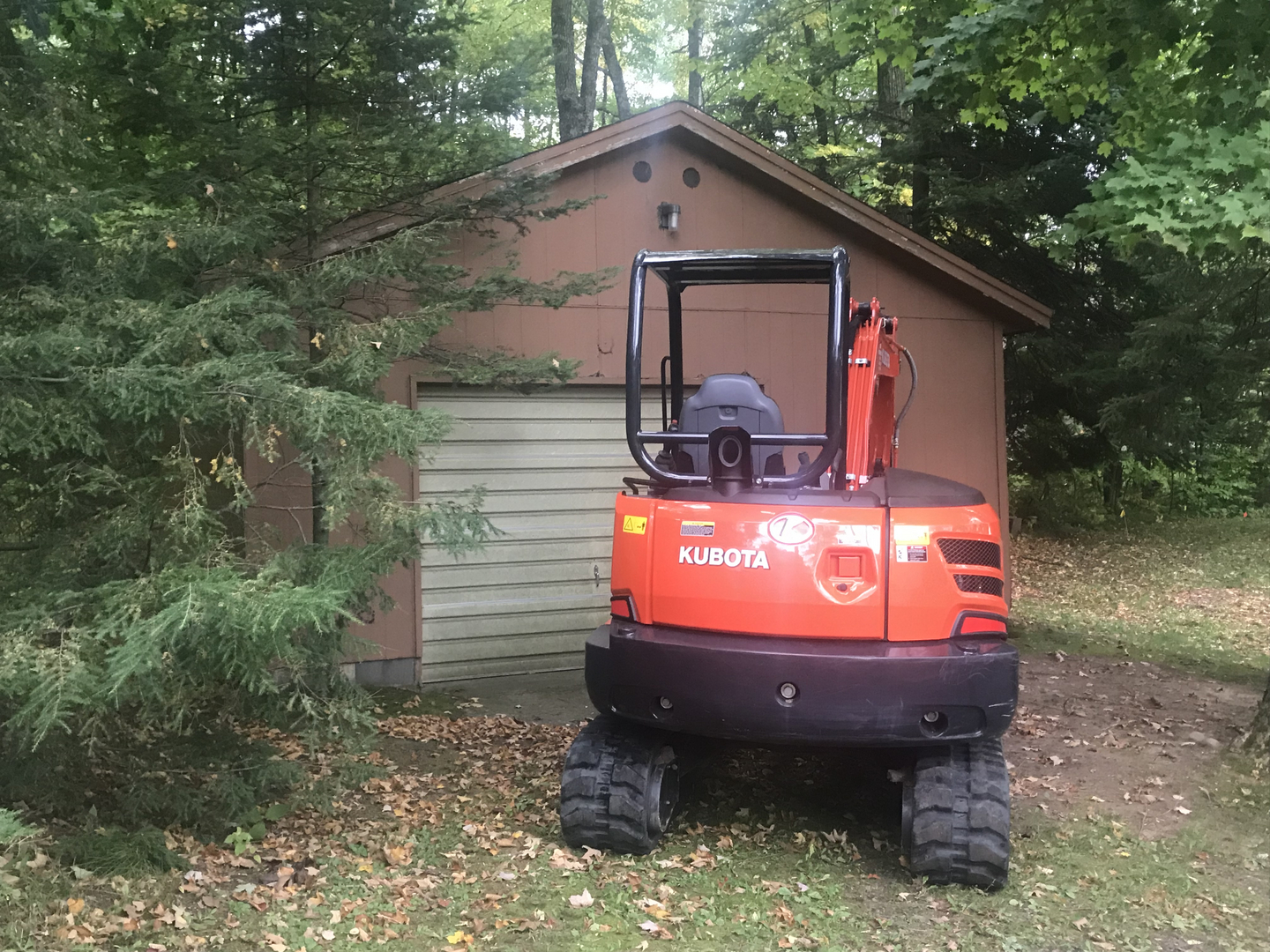 Kubota excavator ready for garage demolition